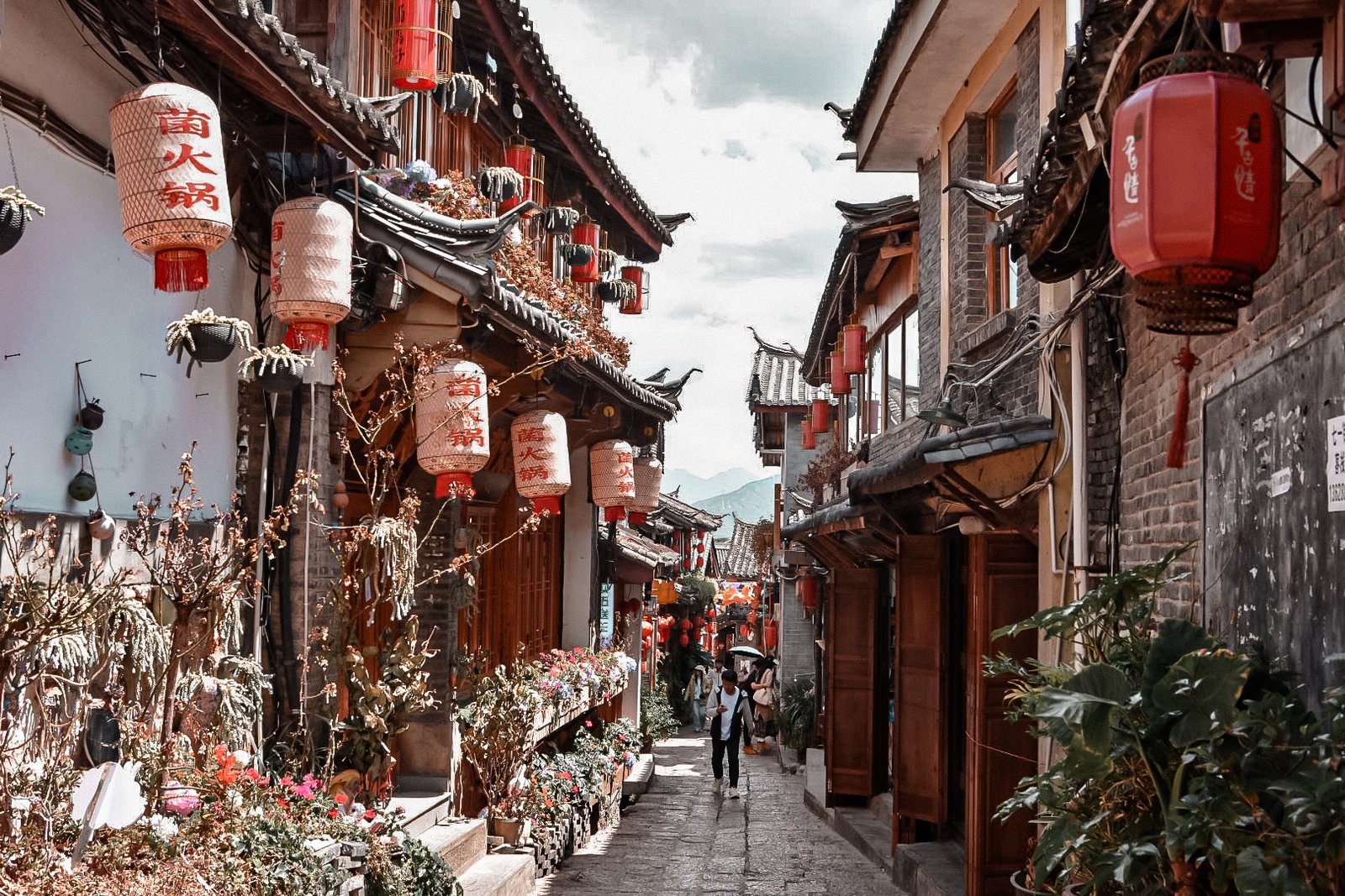 Que faire au Yunnan : mon itinéraire + incontournables 1 Canaux et ponts en pierre de la vieille ville de Lijiang au Yunnan